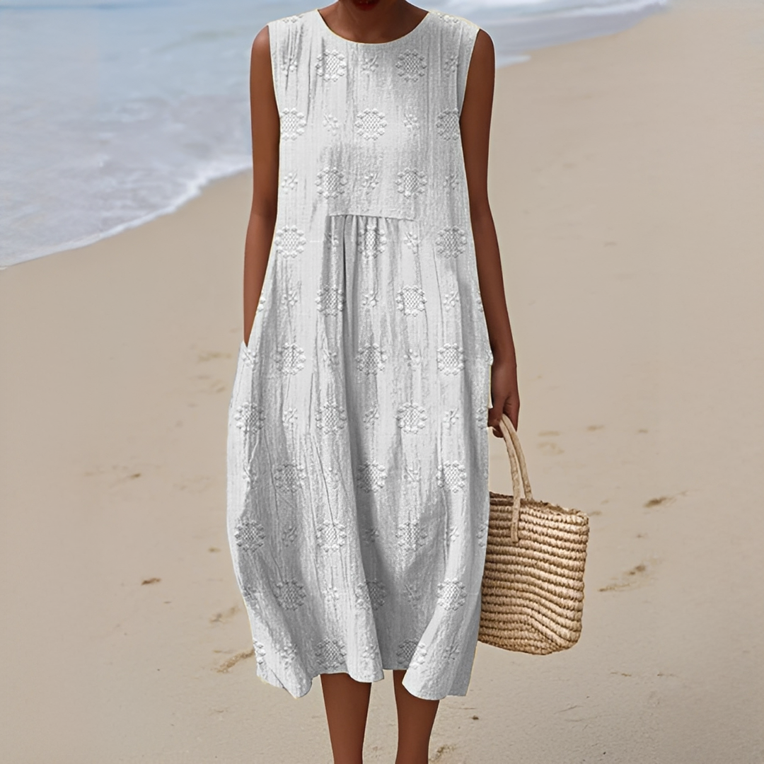 Robe midi estivale femme sans manches, confortable et polyvalente, idéale pour un look frais et élégant en été.