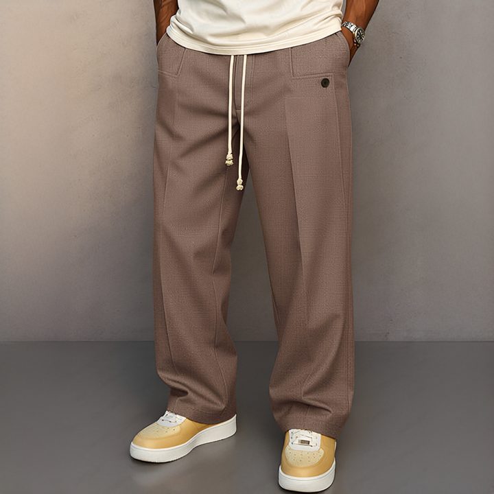 Pantalon confortable beige à cordon, idéal pour un style décontracté moderne au quotidien et les loisirs.