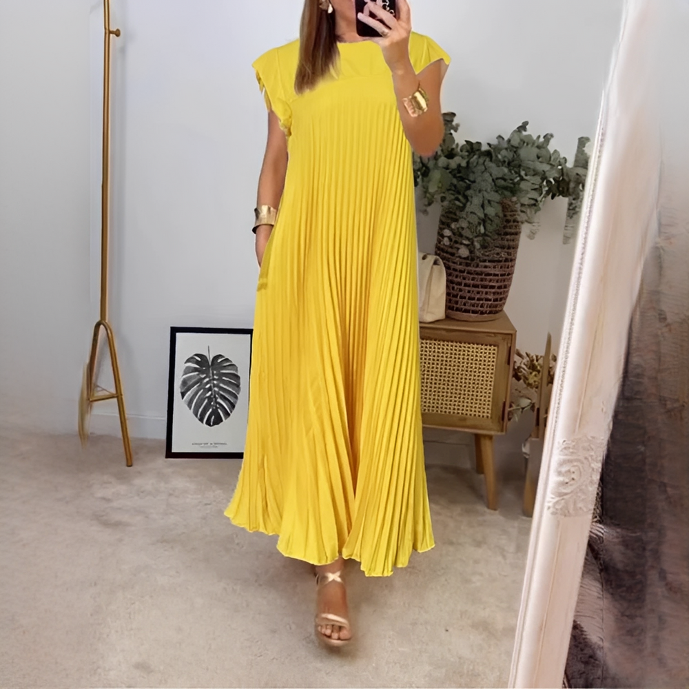 Maxi robe d'été fluide et confortable pour femme, parfaite pour une tenue estivale chic et décontractée.