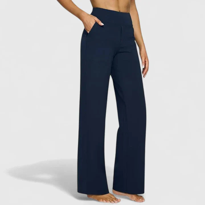 Pantalon femme bleu marine, taille haute, jambe droite, pour un style intemporel et polyvalent.
