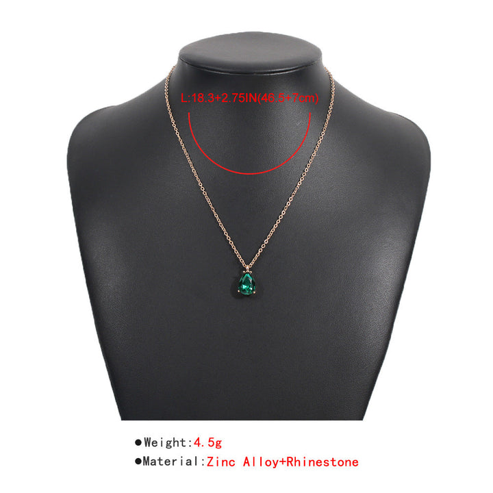 Collier femme élégant, design goutte d'émeraude avec strass. Bijou idéal comme cadeau ou pour une fête.