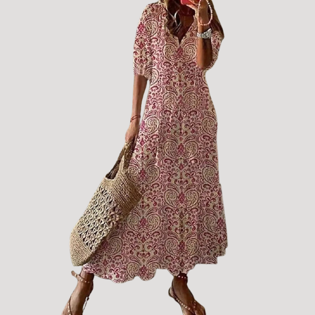 Superbe robe fluide longue femme bohème, motif estival délicat, parfaite pour un été confortable et stylé.