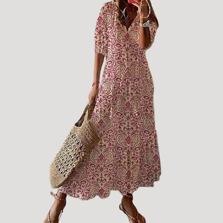 Superbe robe fluide longue femme bohème, motif estival délicat, parfaite pour un été confortable et stylé.