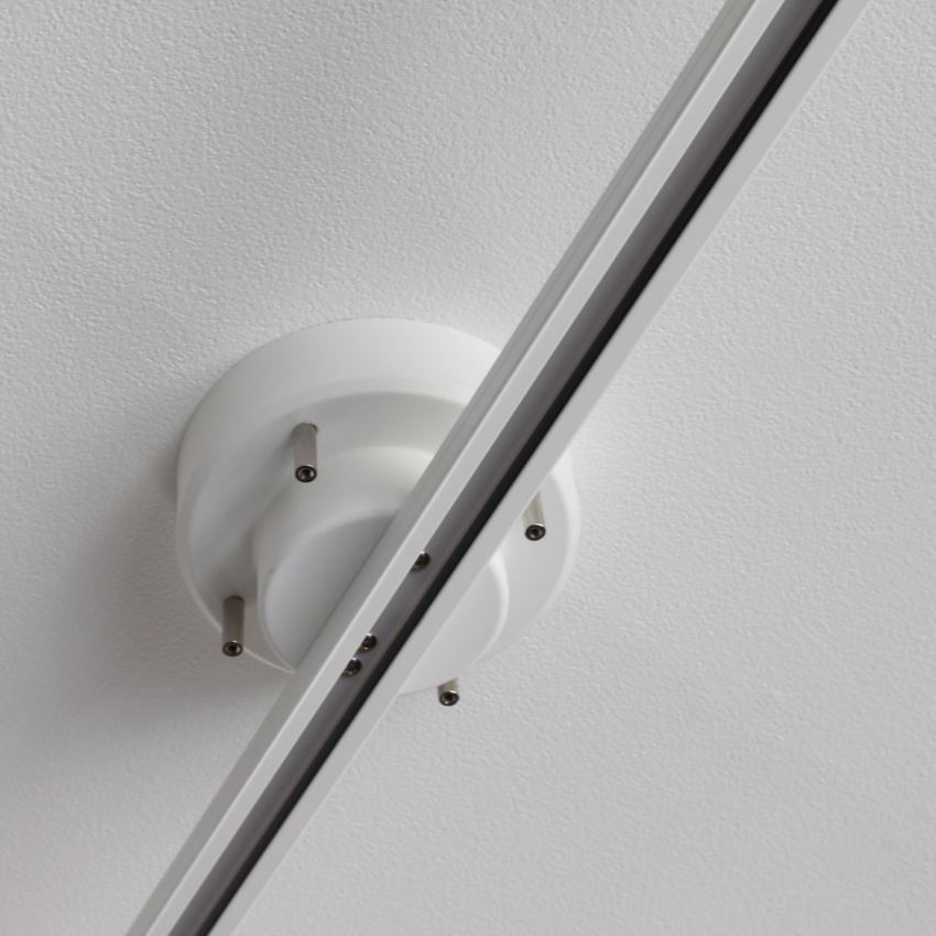 Rail de plafond suspendu, rotatif pour spots et éclairage décoratif, design adaptable intérieur.