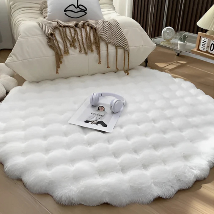 Confortable tapis rond 80cm en polaire ultra-douce, pour un intérieur chaleureux et cosy.