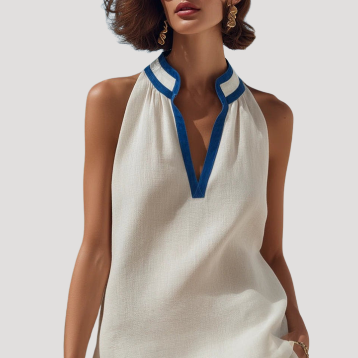 Ensemble femme été, comprenant un haut sans manches et un short, idéal pour les vacances chics et décontractées.