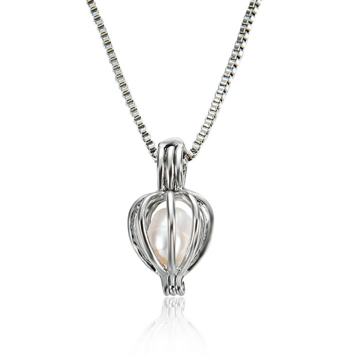 Pendentif perle véritable sur chaîne fine, un bijou élégant et délicat, idéal comme cadeau surprise pour femme.