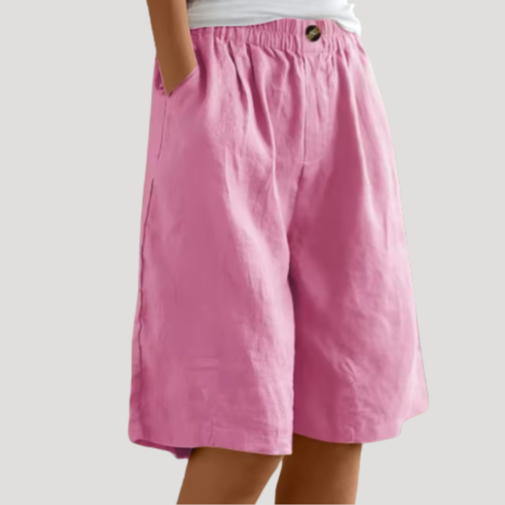 Bermuda d'été femme, chic et fluide. Taille élastique confortable, coupe ample, parfait pour la mode estivale.