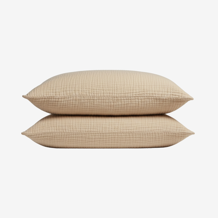 Ensemble 2 taies d'oreiller en mousseline de coton ultra douces, parfaites pour un sommeil réparateur.