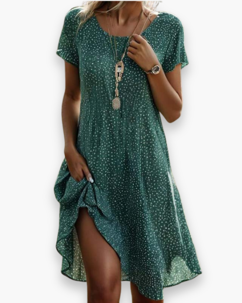 Robe vintage élégante midi pour femme, verte. Style intemporel, parfaite pour l'été et les occasions spéciales.