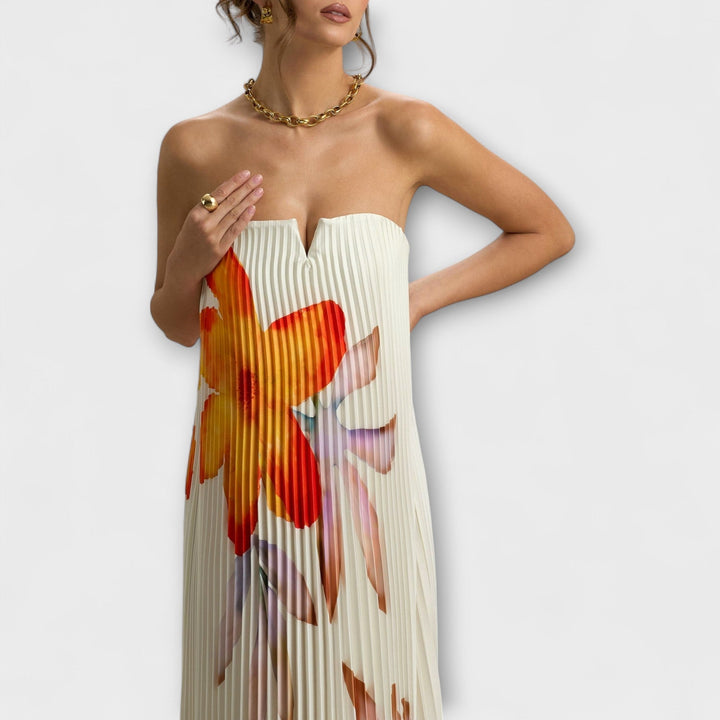 Robe femme chic et élégante, longue, fleurie, avec un joli col cœur pour l'été.