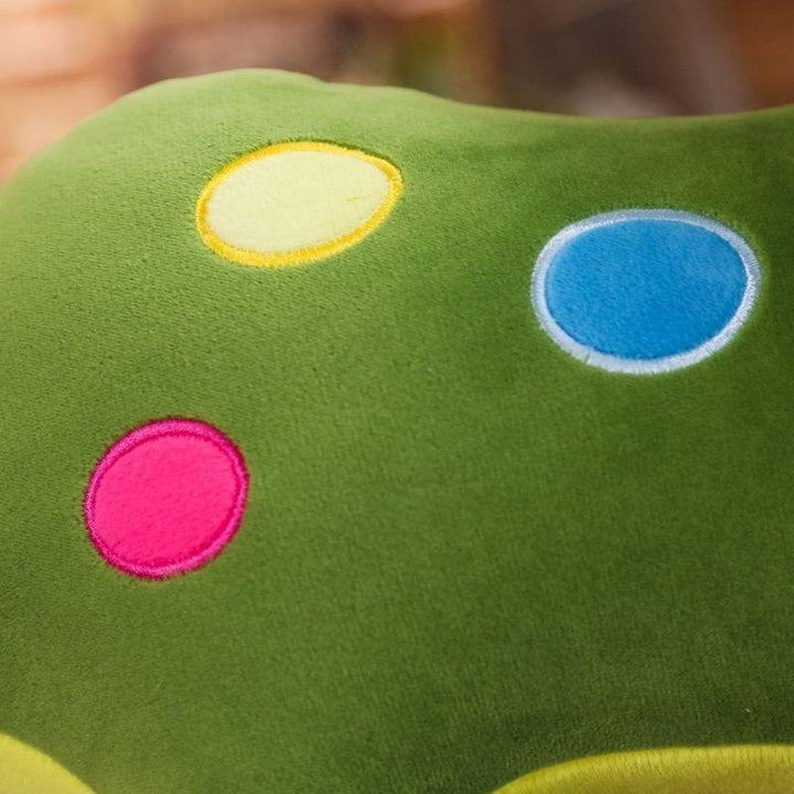 Peluche tricératops géante pour développement sensoriel. Doudou dinosaure doux, parfait jouet pour enfant.