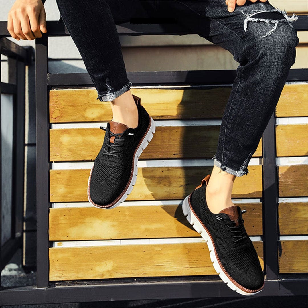 Homme portant des chaussures élégantes et ultraconfortables, marche aisée, style urbain chic.