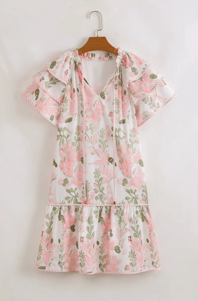 Mini robe fleurie Aura pour femme, chic et légère. Parfaite pour les journées d'été ou les sorties décontractées.