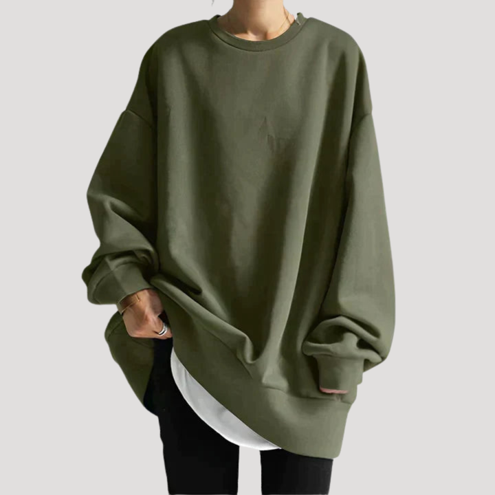Vêtement femme polyvalent : pull oversize col rond, idéal pour l'automne-hiver, style épuré et confortable.