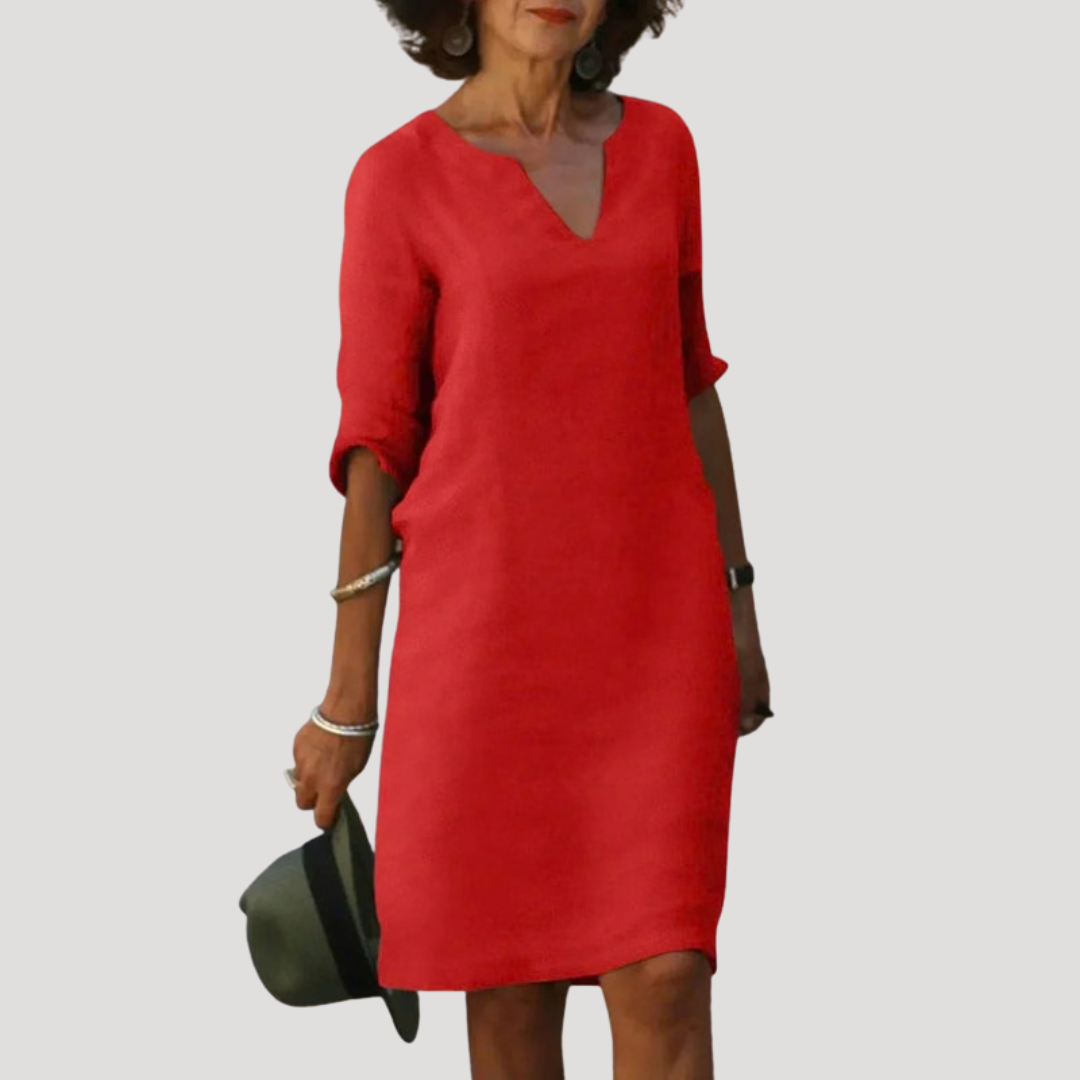 Robe midi femme élégante et fluide, parfaite pour un look chic décontracté. Confortable vêtement femme pour le quotidien.