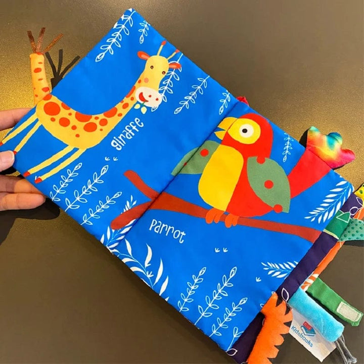 Livre tissu éveil bébé sensoriel, animaux, sons et textures. Jouet idéal pour nouveau-né et développement.
