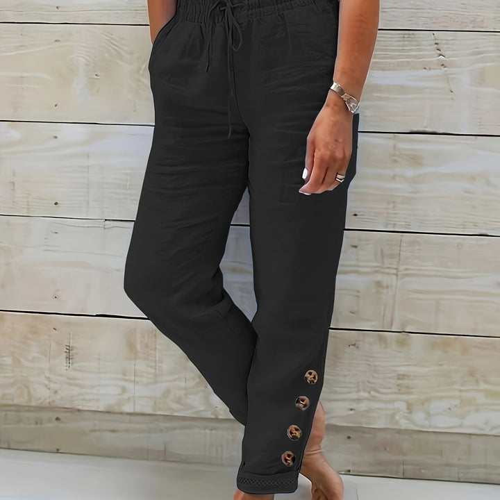 Pantalon femme polyvalent, coupe droite ajustée, parfait pour tenue décontractée et bureau.