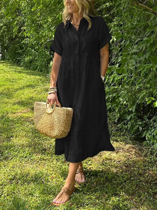 Robe femme fluide et confortable, col rond boutonné, manches courtes. Idéale pour l'été, le style estival décontracté.