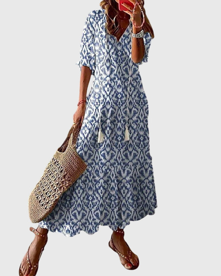 Robe maxi bohème vintage florale pour femme, parfaite pour l'été et les journées décontractées.