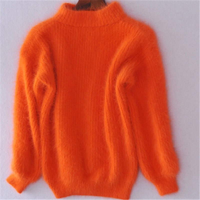 Pull femme élégant et moderne, idéal pour l'hiver, offre confort et style chic. Très féminin.