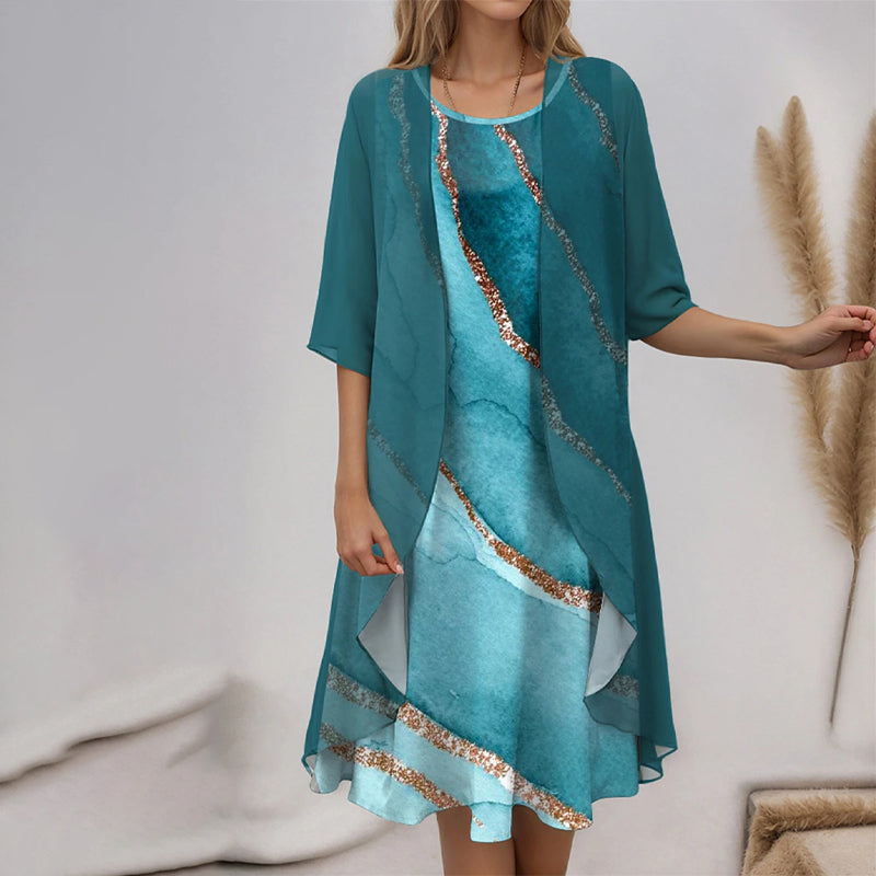 Robe femme fleurie élégante, idéale pour les événements d'été, style raffiné, mode féminine.