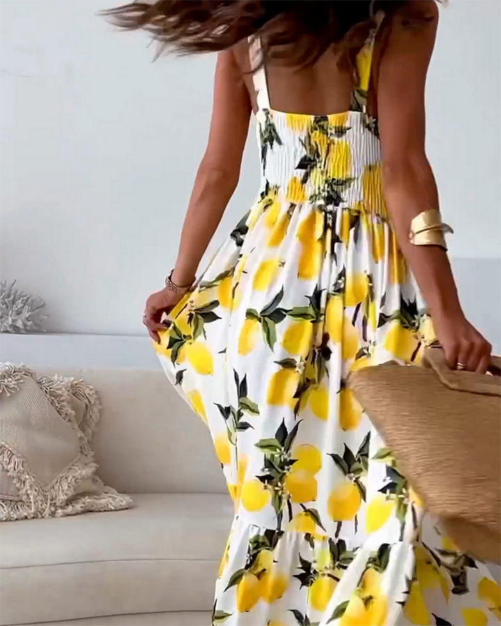 Élégante robe florale jaune style maxi pour femme. Idéale comme robe d'invitée mariage, cocktail ou cérémonie.