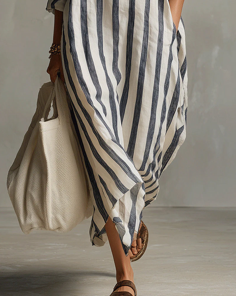 Tenue décontractée chic : robe maxi fluide rayée, manches longues et col revers. Mode femme printemps automne.