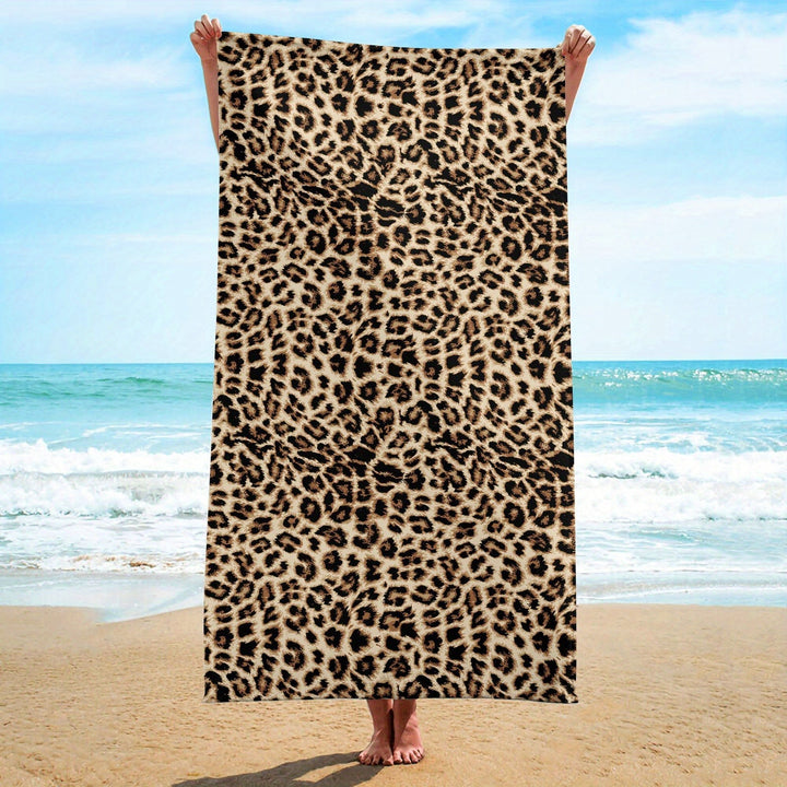 Serviette de plage femme en microfibre douce et compacte. Séchage rapide, idéale pour l'été, le sport ou le voyage.