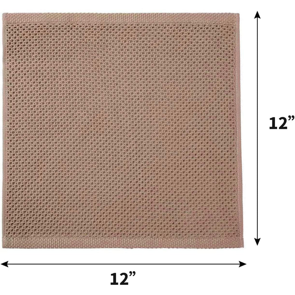 Gros plan sur la texture gaufrée d'un torchon de cuisine en coton, ultra-absorbant pour vaisselle et nettoyage.
