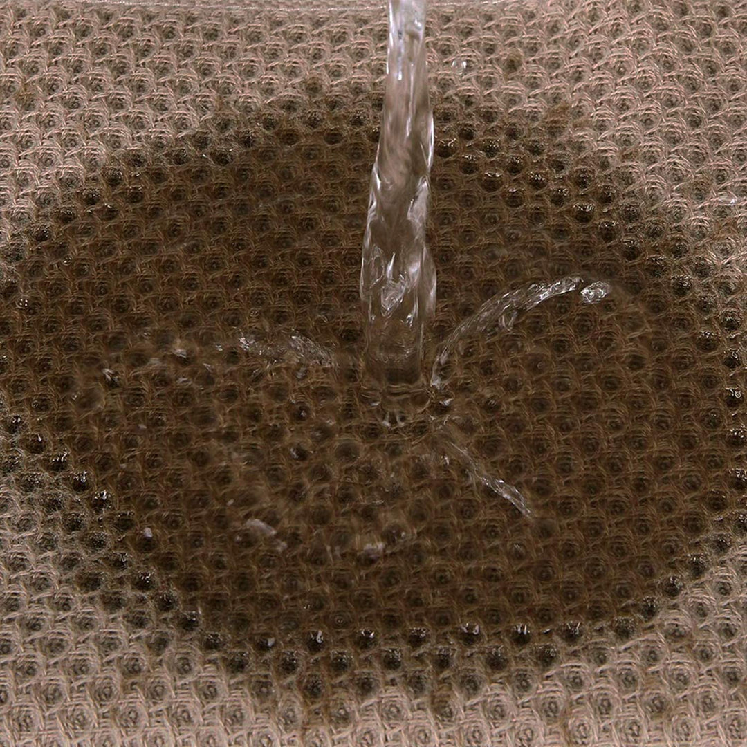 Torchon de cuisine en coton gaufré absorbant utilisé pour sécher des ustensiles, idéal pour la maison.