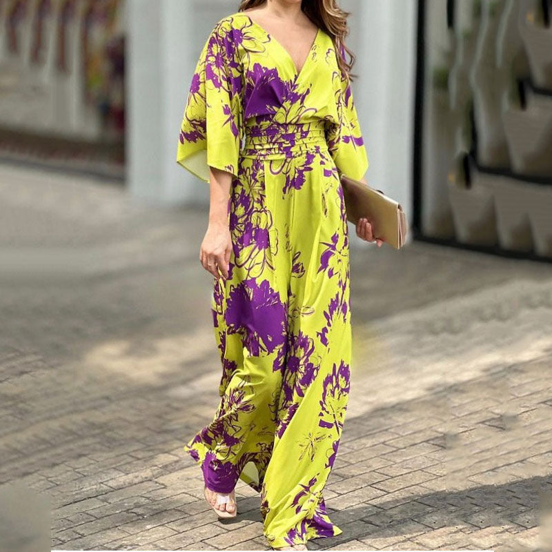 Chic combinaison femme à imprimé floral, taille haute, jambe large pour un look estival et élégant.