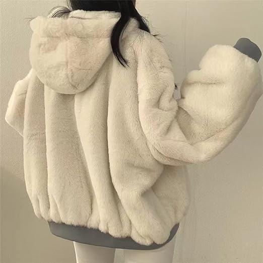 Veste bomber oversize réversible femme, coupe décontractée tendance. Parfait pour un look mode hiver ou mi-saison.