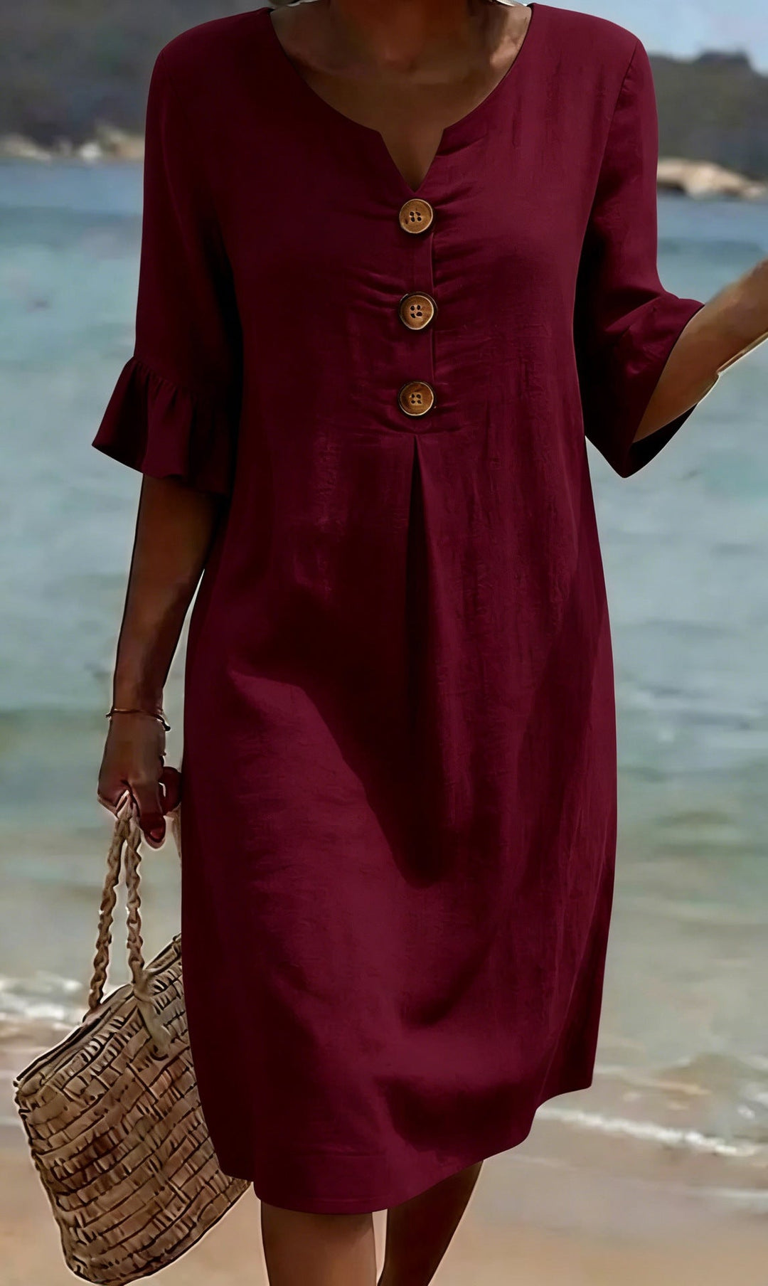 Robe femme respirante en coton lin, boutonnée sur le devant. Manches volantées. Style décontracté pour l'été.