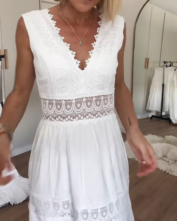 Robe d'été fluide pour femme, midi, col V, sans manches, confortable et stylée pour le printemps.