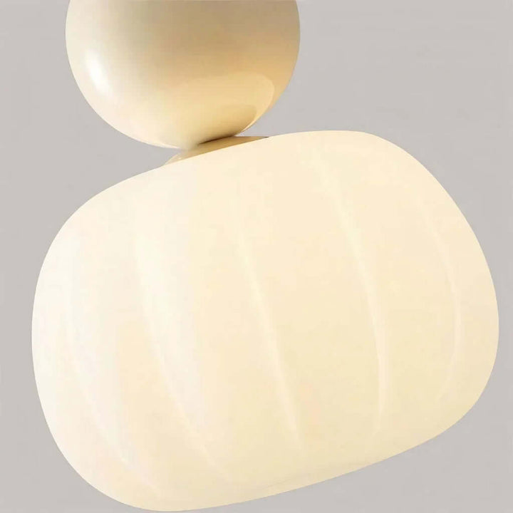 Suspension plafond Art Déco crème, luminaire design qui sublime l'intérieur.