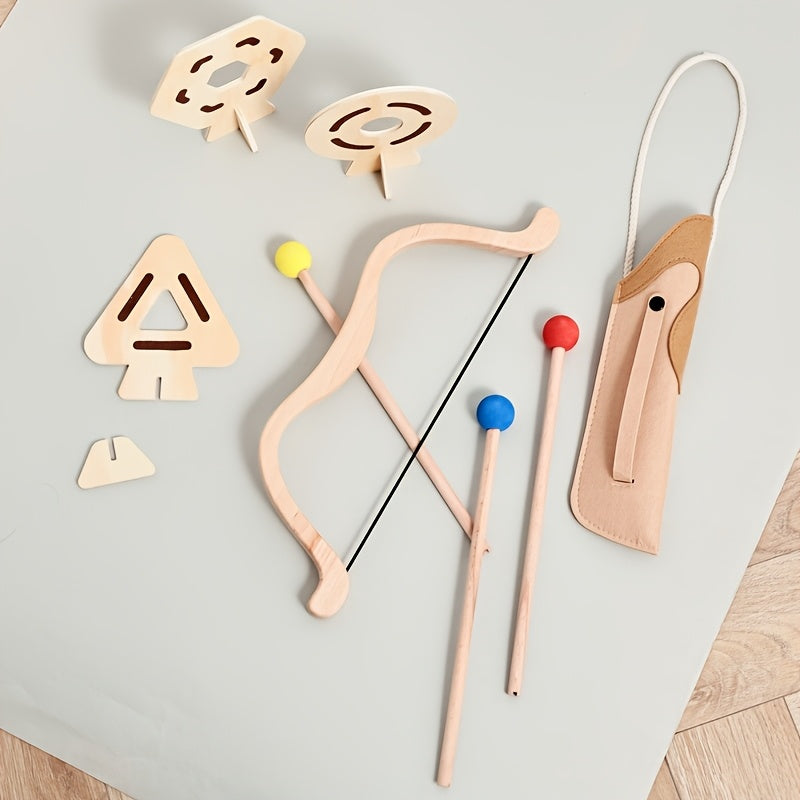 Enfant concentré visant la cible avec son arc junior. Jeu éducatif qui développe la motricité fine.