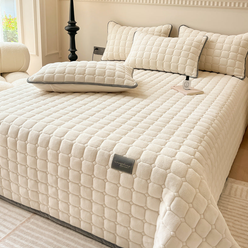 Luxe et confort: couverture de lit moderne à texture carrée, design élégant pour maison chic.