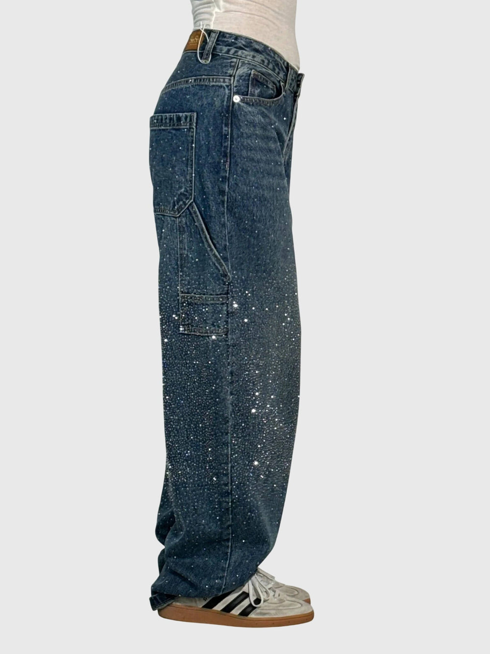 Pantalon noir femme Diamant, style glamour et confortable, parfait pour la mode actuelle.