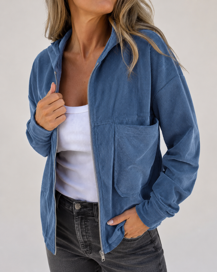 Veste femme à capuche zippée côtelée blanche, style décontracté moderne. Parfaite pour toute saison.