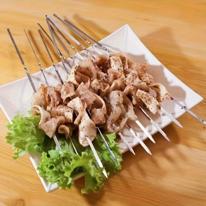 Préparez vos grillades avec ce kit de 20 brochettes en acier inoxydable. Faciles à nettoyer et à ranger.