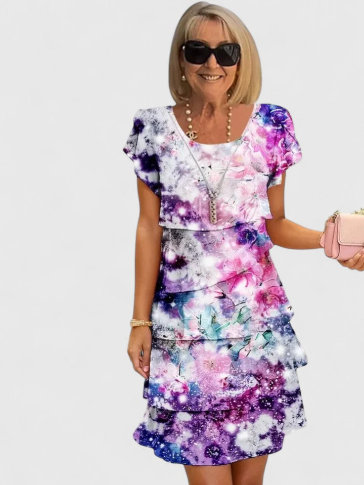 Robe longue fleurie élégante pour femme, style estival chic et confortable avec volants, parfaite pour le jour ou une soirée.