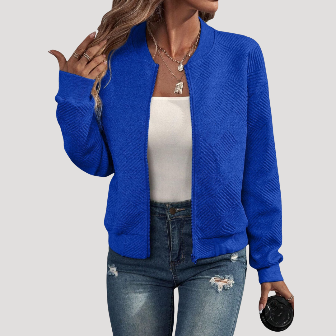 Blouson bomber femme texturé, parfait pour le printemps et l'automne. Veste décontractée, mode urbaine chic.