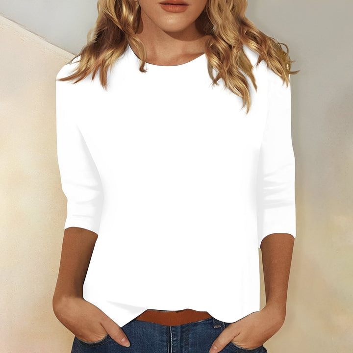 T-shirt femme confortable à coupe ample, avec manches 3/4, essentiel pour la mode décontractée quotidienne.