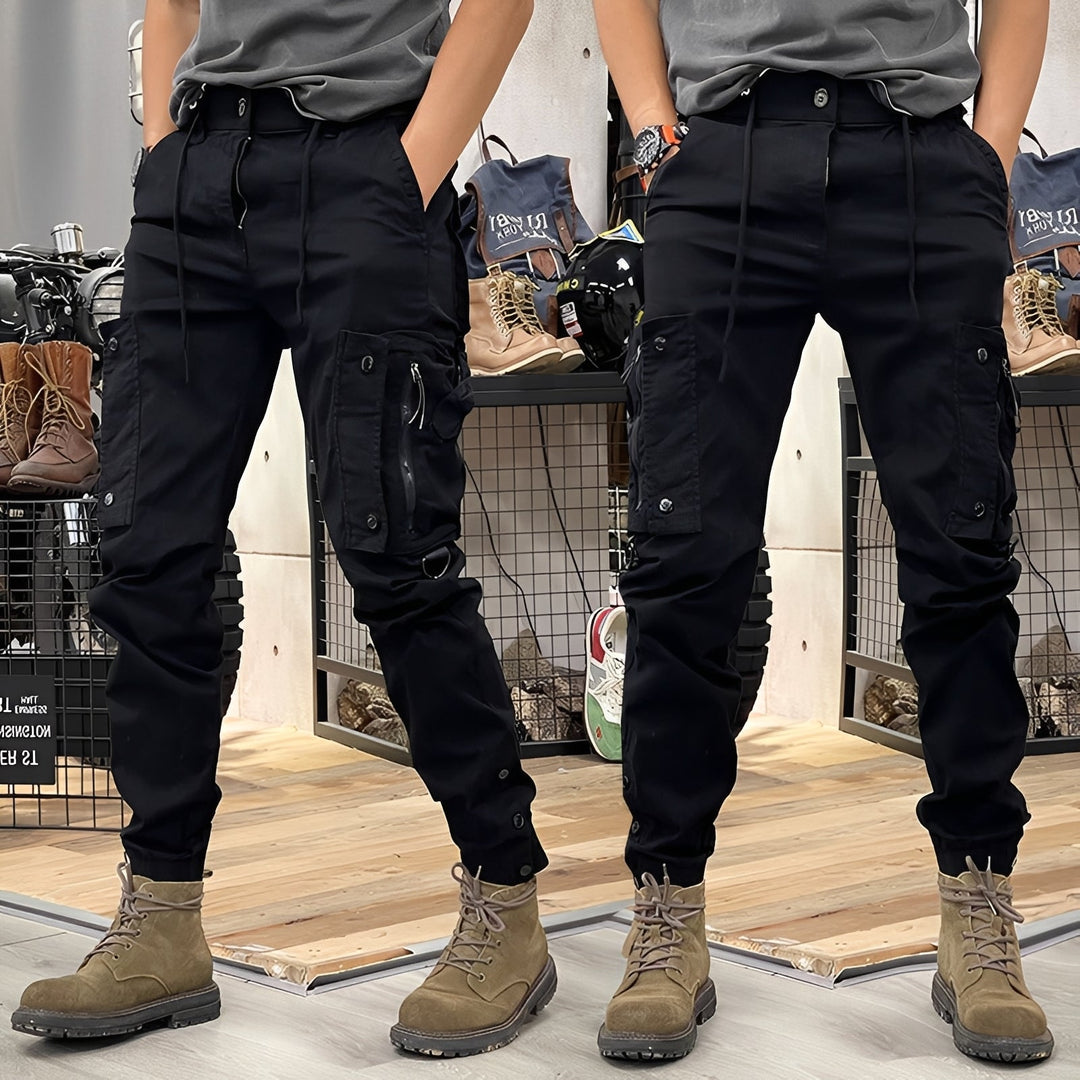 Pantalon homme tactique confortable et polyvalent, parfait pour un style décontracté urbain ou activités d'extérieur.