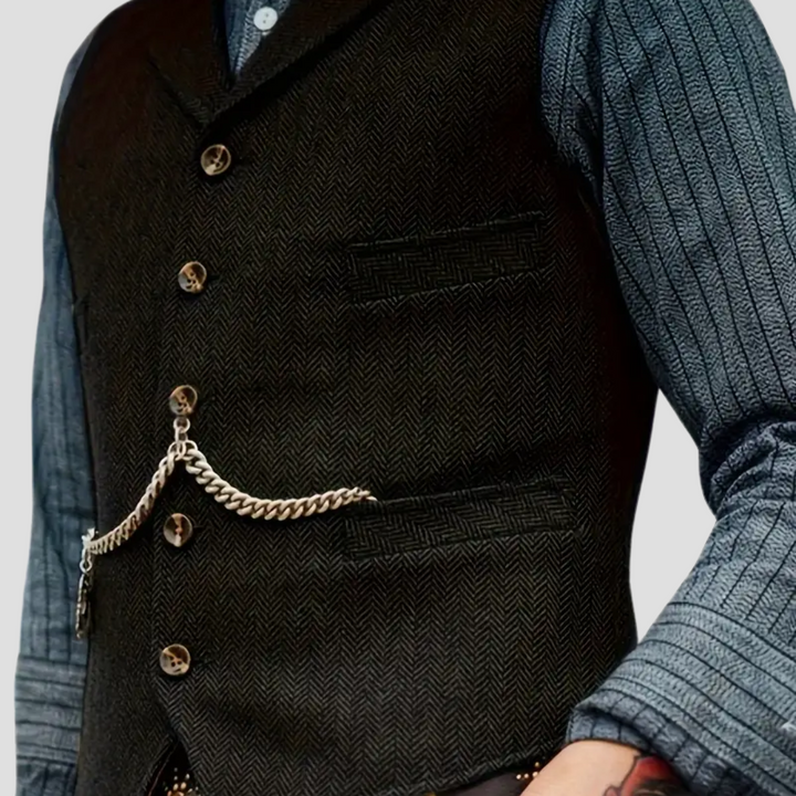 Gilet chic pour homme noir, style formel, tissu de qualité, essentiel pour un vestiaire élégant.