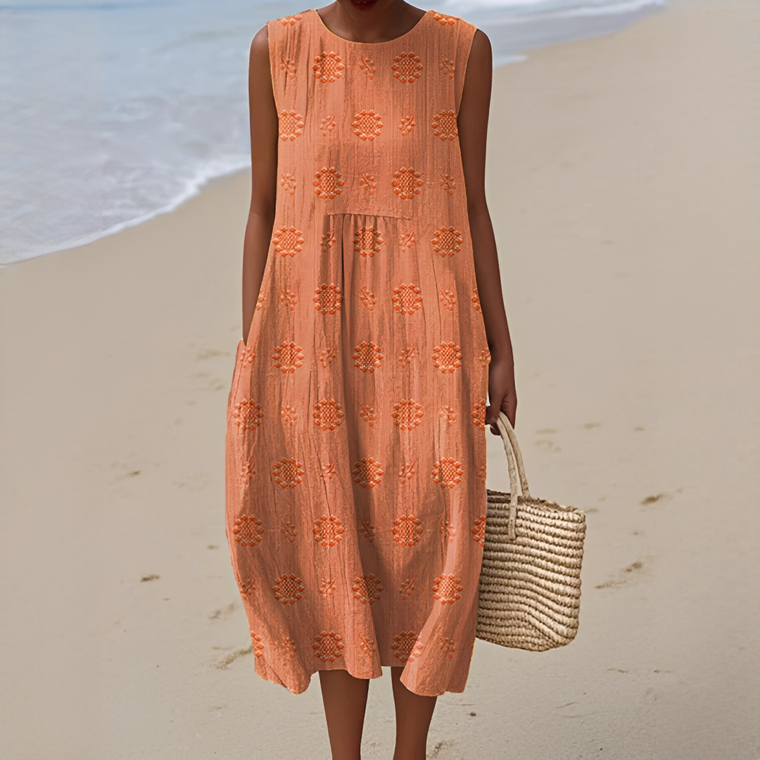 Robe d'été femme douce et légère, coupe midi sans manches, parfaite pour un style décontracté et estival.
