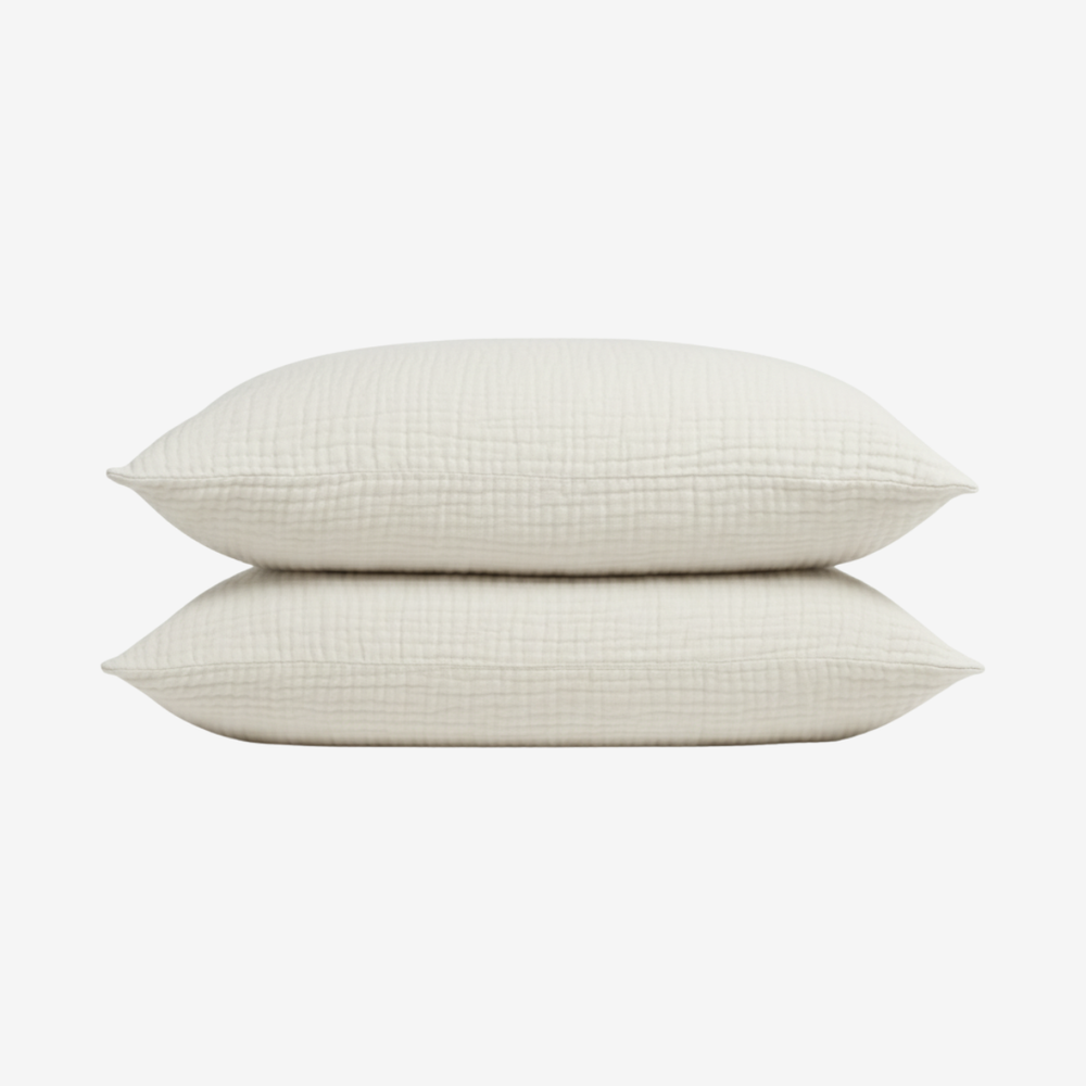 Taies d'oreiller en mousseline de coton pour un confort et une douceur inégalés dans votre chambre à coucher.
