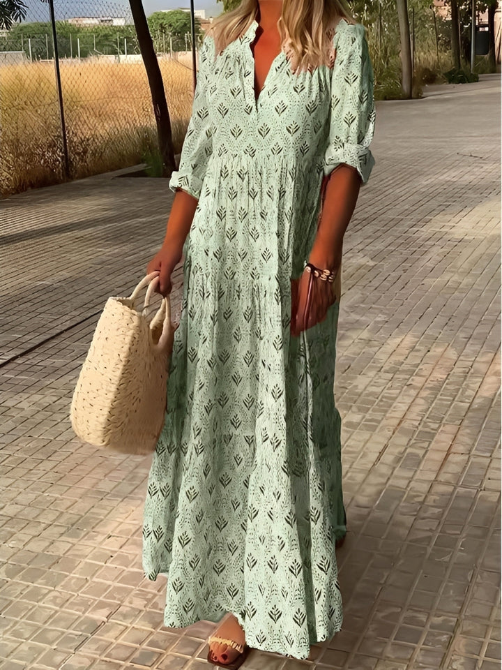 Robe maxi femme fluide et élégante, parfaite pour l'été et les vacances, offrant un confort estival décontracté.