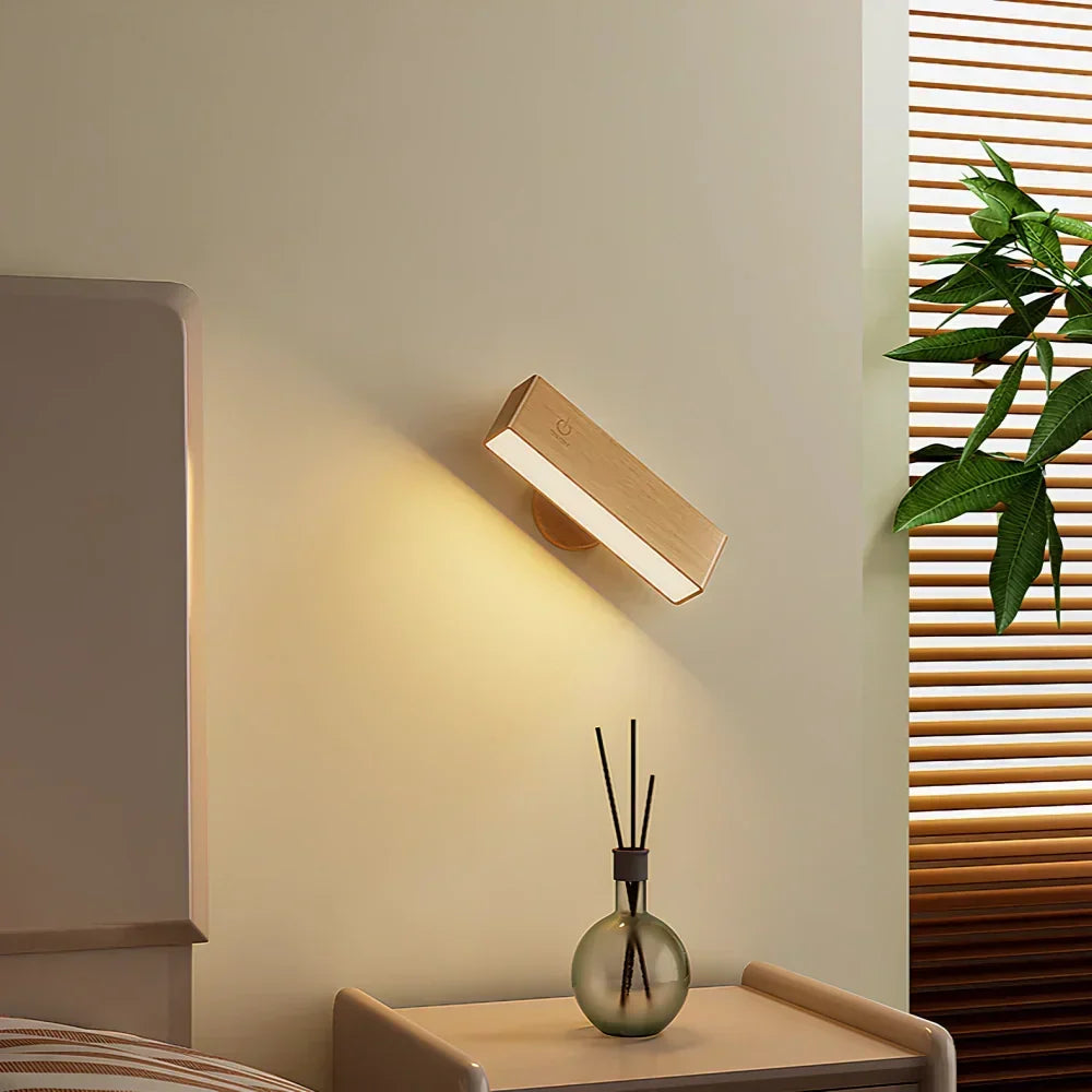 Éclairage mural LED sans fil et rechargeable, dimmable, avec fixation magnétique pratique.